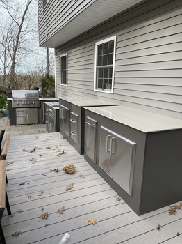 l shaped grill island with lots of storage in modern concrete industrial-1