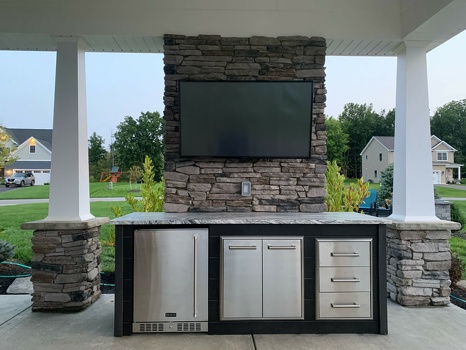 linear refrigerator and storage island on patio with plank charcoal finish-1
